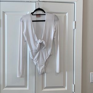 Never been worn, ribbed long sleeve bodysuit